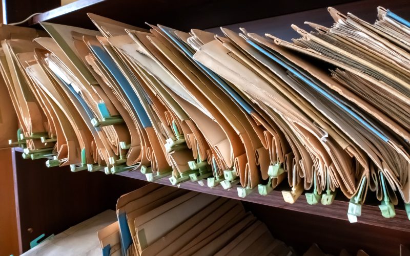 Old folders with documents in the library.