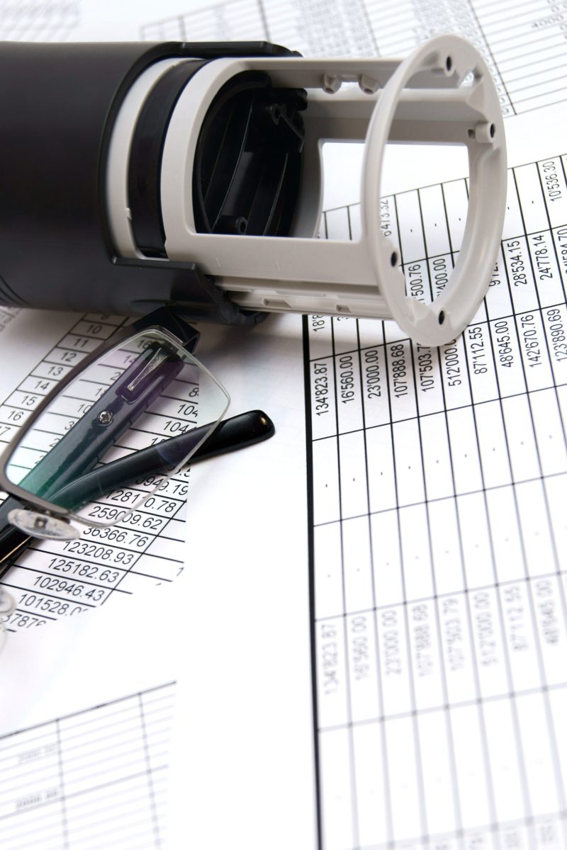 Press and Glasses on documents.